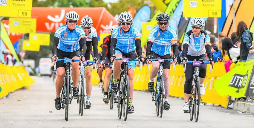 Mallorca M312 cyclists crossing the finish line