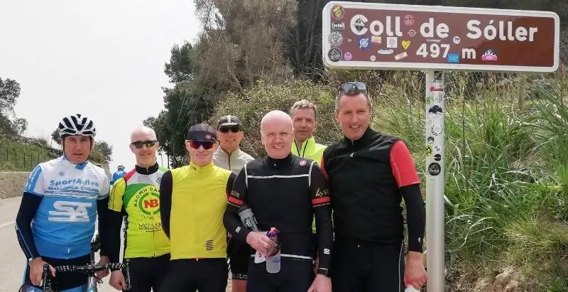 SportActive Team successfully reaching the summit of Coll de Soller with cycling Legend Sean Kelly 